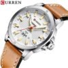 Close-up of CURREN 8376 men’s analog wristwatch dial with clear markers