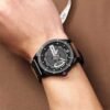 Man wearing CURREN 8301 men’s quartz leather strap watch
