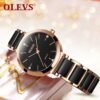 Front view of Olevs 5877 waterproof women’s quartz watch with black stainless steel
