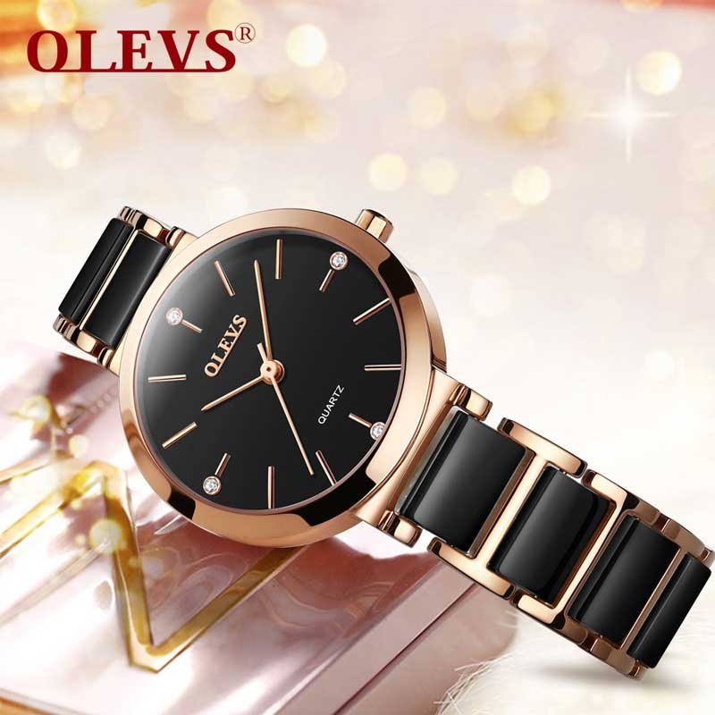 olevs-womens-analog-watch-5877-2 Front view of Olevs 5877 waterproof women’s quartz watch with black stainless steel